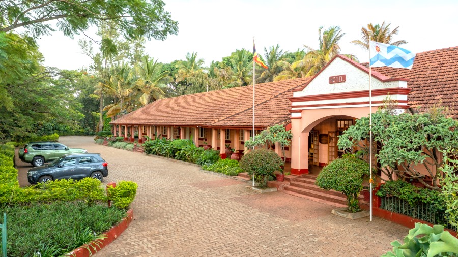 Masindi Hotel Uganda's oldest hotel. main building with Flags. PHOTO John Davis Photography